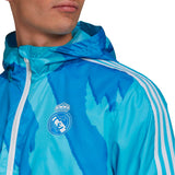 adidas Men's Real Madrid 2021 Windbreaker Bright Cyan Crest Detail